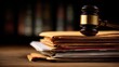 © Pixelzone - Stunning photo of stack of legal folders and documents next to a wooden judge's gavel on a table, symbolizing law and justice.