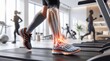 © Mudassar Mushtaq - Person running on treadmill with ankle pain