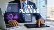 © Ethan - Professional businessman working on tax planning with digital interface, analyzing financial data on laptop and tablet in modern office for accounting and business strategy
