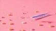 © Elena - Female reproductive health care items on pink background. Pills, condoms and other health products.