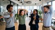 © Eve - Happy multiracial office workers stretching arms doing morning exercise workout physical activity break together