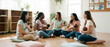 © Yana - Diverse mothers attending breastfeeding support group with babies. World Breastfeeding Week education and community care
