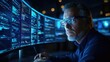 © MUMTAZ - Middle-aged Software Developer Monitoring Server Code on Multiple Screens