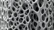 © Yuliia - Microscopic view of porous bone structure showing trabecular network with irregular cavities and dense mineralized matrix, suitable for medical and scientific publications.