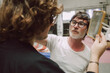 © Luciano Spinelli/Stocksy - Attentive barber working in studio
