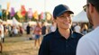 © SimpleDesignStudio - Female Security Guard Talking to Visitor at Outdoor Music Festival Event