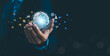 © wanchai peatoo - Global business technology concept featuring a digital world globe in a businessman’s hand, symbolizing innovation, data analytics, cloud computing, digital transformation, global networking.