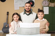 © Pixel-Shot - Happy music teacher with young students learning piano, educational development and creative arts
