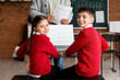 © Pixel-Shot - Young children learning piano with teacher, music education and early childhood development, happy kids playing keyboard instrument