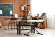 © Pixel-Shot - Music classroom interior with keyboard, guitar, and chalkboard for learning and education