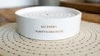 © Aisyah - Elegant ceramic bowl with inspirational text on gut energy and purity, designed for home decor and wellness promotion