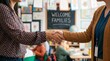 © velikiyzayats - Parent and Teacher Handshake in Classroom for School Meeting Partnership Concept Professional Collaboration Between Mother and Educator in Preschool Setting