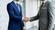 © P-Y-L  Art - Close-up of business men in suits shaking hands in modern corporate office with handshake business professional cooperation