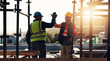© peopleimages.com - Engineer, high five and men at construction site for welcome, funny or agreement for renovation process. Flare, smile and people with partnership, architecture progress and collaboration for project