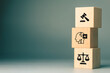© patpitchaya - Wooden blocks showing law, artificial intelligence, and judicial enforcement, representing AI governance, regulation, compliance, accountability, ethics, and legal oversight