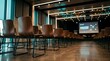 © MopoWe - Empty conference chairs in modern seminar hall with screen for corporate event marketing
