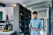 © Westend61 - Man regulating light with his digital tablet