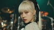 © hakule - Young Woman With Platinum Blonde Hair Posing Against Drums