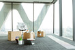 © Westend61 - Cardboard boxes on empty office floor