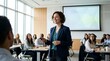 © Alva - Smiling woman presenter leading a business meeting or training session in a bright modern conference room with a diverse group of attendees.