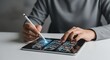 © SABYDA - Person using stylus on tablet screen with digital checklist and checkmarks hand