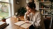 © phj.domingos - Woman thoughtfully reviewing her goals and plans in a notebook at home
