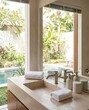 © Namsun - Minimal Hospitality Bathroom Detail with Refined Stone Finish
