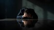 © ATime7Day - Desperate CEO sitting alone in shadows with dramatic side lighting.