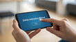 © Nguyen - Close up view of a person holding a modern smartphone displaying a digital online instruction manual on the screen with a prominent blue read button for electronic user guide assistance.