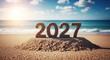 © Rajib Biswas - New year 2027 beach scene with sandy numerals and ocean waves