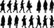 © MDMizanur - Women using smartphone silhouettes set featuring female pedestrians walking standing text message and holding shopping bags isolated on white background