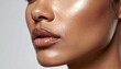 © harryaishi - Close-up of a person's face with highly glossy skin and plump lips, angled