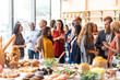 © Rawpixel.com - Lively social gathering with food