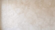 © MuhamadAndrew - Textured Beige Plaster Wall Surface with Subtle Light and Shadow Play