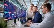 © Andrey Popov - Diverse Team Works Together Building Software