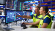 © Andrey Popov - Two Coworkers Studying Logistics Data On Computer Screens