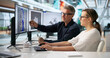 © Andrey Popov - Two Engineers Use Computer Software