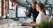 © Andrey Popov - Manager And Team Collaborate On Laptop Using Scrum Board