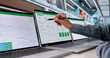 © Andrey Popov - Mature Woman Reviews Sustainability Data And ESG Metrics
