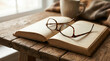 © Janna - World Teachers Day eyeglasses on open book on wooden table