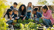 © Rafly - Diverse Children Learning Science Outdoors in a School Garden with Teacher, Plants, Notebooks, and Hands-On Environmental Education Activity