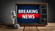 © Moon - Retro TV and microphone showing urgent “BREAKING NEWS” alert