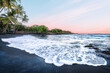 © EyesTravelling - Peaceful Sunset on a Black Sand Volcanic Beach with Palm Trees and Pink Sky, Punaluu, Big Island, Hawaii, USA