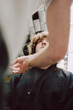 © Luciano Spinelli/Stocksy - Detail of haircut session