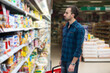 © Jale - Handsome Young Man Shopping In A Grocery Supermarket