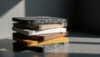© Vadym - Stack of assorted composite material samples in various colors, textures. Material swatches offer diverse finishes for interior design. Samples show speckled patterns, solid hues. Swatches useful for