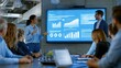 © Anatoll Paveel - Team gathers around large screen displaying data charts