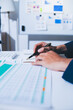 © Sutthicha - Accounting company provide finance and taxation planning for profitable cash flow, Auditor and accountant team working in office, analyze financial data and accounting record with calculator