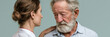 © ON - Studio - Female nurse comforting a sad elderly man. Healthcare professional supporting a distressed senior patient. Medical empathy and care concept