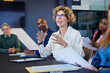 © Rido - Mature businesswoman talking in a office meeting
